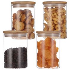 three glass jars filled with different types of food