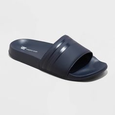 Why we're ALL IN: Medium-width sport slide sandals with an open toe and heel design are designed to keep you comfy during outdoor activities. Made with a cushioned footbed and treaded outsole, the slip-on style of the sandals allows for easy on and off. The D-toe design and a solid hue complete the look. All in Motion™: Made for every move, priced for every day. Slip-resistant Synthetic Slide Sport Sandals, Sporty Open Toe Slippers With Cushioned Footbed, Sporty Open Toe Flip Flops With Textured Footbed, Sporty Textured Footbed Open Toe Flip Flops, Sporty Open Toe Sandals For Swimming, Fade-resistant Slip-on Sandals For Summer, Sporty Open Toe Synthetic Slippers, Blue Slip-resistant Sandals For Summer, Slip-resistant Open Toe Synthetic Slides