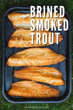 smoked salmon on a grill pan with the words brined smoked trout in it