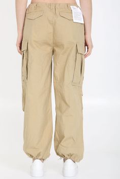 Step up your style game with these effortlessly cool BALLOON ARMY PANTS. Made with high-quality Japanese cotton, they offer a relaxed, oversized fit, cinched ankles, and a multi-pocket design for added functionality. Whether you're running errands or hanging out with friends, these pants are the perfect combination of comfort and style. Khaki color Cinched ankles Zip and button closure Drawstring waist Multi-pocket design Oversized fit | R13 Women's Balloon Army Pants in Green | Size Small | R13 Army Green Pants, Army Pants, Japanese Cotton, Green Pants, Leather Cap, Mens Fall, Khaki Color, Sweaters Knitwear, Emilio Pucci