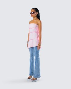 This look is giving us all the nostalgia 🤩 Pairing a pink jersey satin tie top with blue mid rise jeans, this c*nty two-piece set is serving Y2Slay energy at it’s finest 💅 Spring Jeans For Night Out, Chic Party Jeans For Summer, Chic Summer Party Jeans, Fitted Jeans For Summer Parties, Chic Pink Flare Jeans, Y2k Pink Jeans For Spring, Chic Pink Jeans For Spring, Trendy Pink Satin Top, Pink Fitted Denim Top