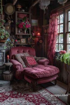 a living room filled with lots of furniture and flowers in the window sills