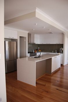 the kitchen is clean and ready for us to use in its new owner's home