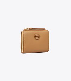 McGraw Bi-Fold Wallet: Women's Designer Wallets | Tory Burch Slim Bifold Wallet, Elegant Tan Bifold Wallet, Tan Leather Wallet, Rectangular, Tan Leather Rectangular Wallet, Luxury Bifold Coin Purse With Coin Pocket, Compact Leather Wallet For Everyday, Compact Everyday Leather Wallet, Tan Bifold Wallet For Travel, Tan Bifold Wallet With Card Slots