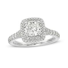 a cushion cut diamond ring with double halos