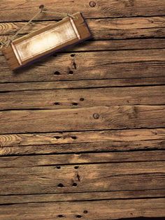 a wooden table topped with a bottle of wine