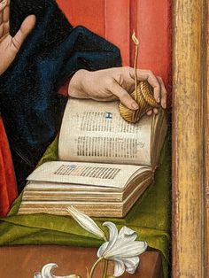 a painting of a person holding a book with a flower on it and praying in front of an open book