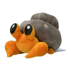 a stuffed animal snail with big eyes laying down