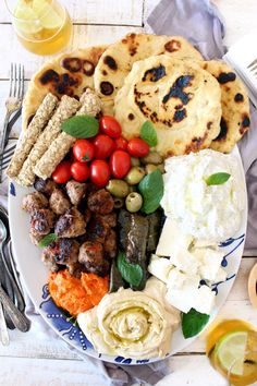 a white plate topped with different types of food