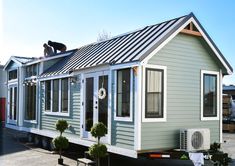 a tiny house being built on the back of a truck