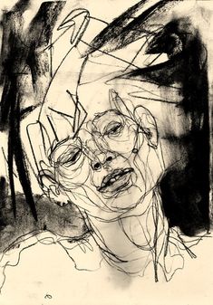 a black and white drawing of a woman's face