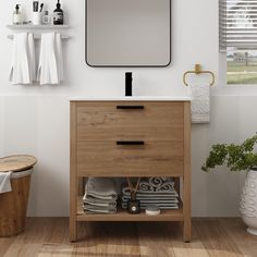 a bathroom with a wooden cabinet and mirror