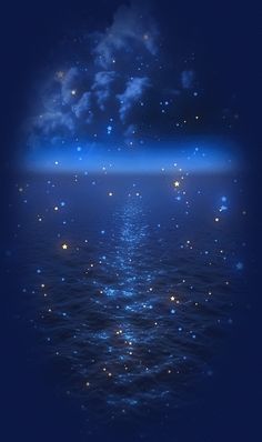 an image of the ocean with stars in the sky and clouds above it at night