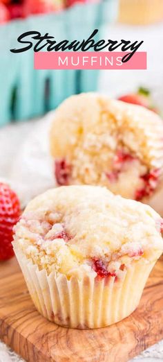 strawberry muffins on a cutting board with strawberries in the background and text overlay