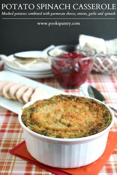 Potato Spinach Casserole in a small white baking dish  on a red checkered table cloth. Potato Spinach Casserole, Aligot Recipe, Pantry Recipe, Breakfast Potato Casserole, Potato Spinach, Hamburger Casseroles Recipes, Mac And Cheese Casserole, Recipe Spinach, Vegetable Casserole Recipes