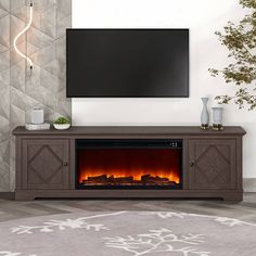 an entertainment center with a fireplace in the middle and a flat screen tv above it