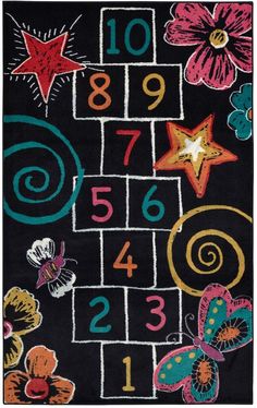 a black rug with numbers and flowers on it