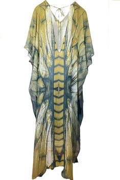 Freya Ashtanga Kaftan, this beautiful v-neck printed caftan in pure silk is cut oversized for an elegant drape and voluminous movement. Featuring a deep v-neckline and adjustable tie at the back. This dress can be transformed from day to night. Wear it as evening wear or as part of your beach outfit. 100% Silk Dry clean Handmade in Ireland FREYA PRINT: A dragonfly inspired print with shiny, iridescent, delicate and intricate wings in an ombre palette of metallics, antique gold, copper, bronze, c Green Silk V-neck Kimono, Elegant V-neck Kimono For Beach Cover-up, Spring Silk V-neck Kaftan, Silk V-neck Beachwear Dress, Elegant V-neck Kaftan For Vacation, Chic Silk Kaftan For Beach Cover-up, Chic Silk V-neck Kaftan, Oversized Silk Bohemian Kimono, Elegant V-neck Kimono For Vacation