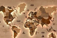 a wooden world map with lights on it