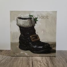 a painting of a black boot with a christmas decoration on it