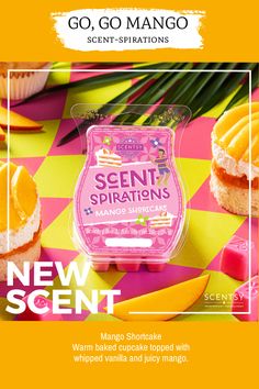 an advertisement for a new scent with oranges and cupcakes on the table