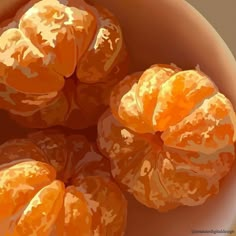 three peeled oranges sitting in a brown bowl