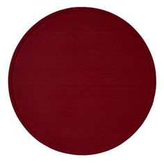 a red round rug on a white background