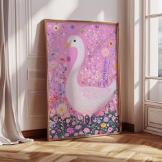 a pink painting with a white duck in the middle and flowers on it's sides