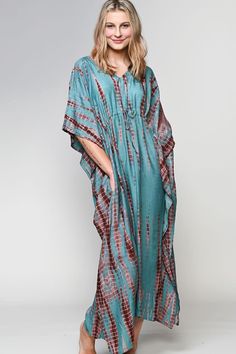 "Our Shibori Caftans are made with a luxurious 100% cupro material that is artistically hand tie dyed using the shibori tie dye technique. Women artisans in Western India do the shibori tie dye and the natural cupro material absorbs the colors beautifully. Cupro is a sustainable natural material that is made from the inner filaments of the cotton seed, so these garments have the look and feel of silk, but the breathability and easy care of cotton. These elegant free size caftans feature a drawstring gather at the waist and are designed for a comfortable fit up to XXL size. One size fits most, 53\" length." Kaftan Patterns, Shibori Fashion, Shibori Dress, Stylish Tunic Tops, Kaftan Pattern, Stylish Tunic, Heavy Dresses, Cotton Caftan, Tie Dye Fashion