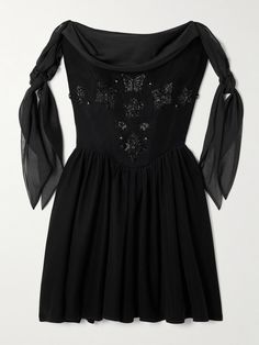 EXCLUSIVE AT NET-A-PORTER. From the midnight-black shade to the hand-beaded florals, Clio Peppiatt's 'Iris' mini dress exudes a dark romance. It's made from wispy crepe de chine and has an elegant off-the-shoulder neckline framed by knotted straps. Internal boning supports the slim-fitting bodice.