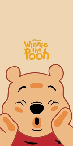 winnie the pooh is holding his head with both hands