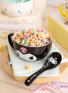 a bowl filled with cereal sitting on top of a table