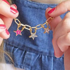 A stunning gold plated colourful enamel star necklace which spells out the name of your choice. This lovely name in stars necklace features dainty little enamel letter stars suspended from a gold plated necklace. The necklace would make a lovely personalised gift for any friend, sister, neice or daughter. Choose a name or word up to 8 letters, or choose initials that have special meaning. Presented on the sentiment card of your choice in an organza gift bag. If you would like to upgrade your pur Which Spells, Chunky Choker Necklace, Stars Necklace, Stars Gold, Chunky Choker, Lapis Lazuli Pendant, Gold Flecks, Enamel Necklaces, Colour Chart