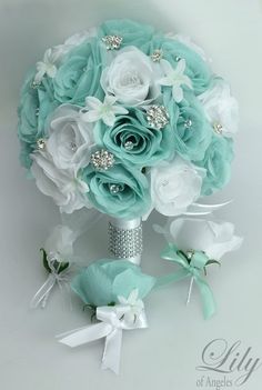 a bridal bouquet with white and blue flowers