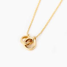 PRICES MAY VARY. 14K SOLID GOLD — Crafted to capture elegance, this Gelin Interlocking Circle Necklace is a shining testament of love. Made of 14K Solid Gold, its minimalist design features two intertwined rings, symbolizing unity and forever bonds. A wonderful gift idea, this bespoke 18" necklace brings sophistication to any attire. Experience the luxurious allure of 14K gold at its finest. FOR ANYTIME, ANYWHERE — Designed for everyday functionality, this dainty piece suitable for errands, offi Double Circle Necklace, Interlocking Circle Necklace, Gold Jewelry Gift, Real Gold Jewelry, Enduring Love, Infinity Necklace, Necklace Craft, 14k Gold Necklace, Necklace Minimalist