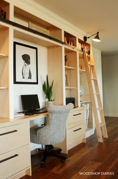 a desk with a laptop on it next to a ladder