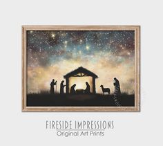 a nativity scene with the birth of jesus and three wise men, framed in a wooden frame