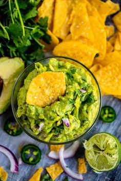 guacamole with tortilla chips and avocado on the side