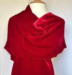 Luxurious and incredibly scarlet red silk velvet scarf. This scarf is extremely versatile; ideal for wrapping up in the cold weather and offers a touch of glamour to any outfit, whether it be casual or for a special occasion.  This will be perfect as a gift or a treat for yourself.  Composition: 60% Silk and 40%Viscose Elegant Red Scarf For Festive Season, Elegant Red Festive Scarf, Red Shawl Scarf For Weddings, Red Festive Shawl Scarves, Red Silk Shawl Scarf For Winter, Elegant Red Scarf For Fall, Red Silk Shawl For Winter, Festive Red Shawl Scarf, Elegant Winter Festive Scarves