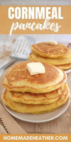 two pancakes with butter on top and the words cornmeal pancakes above it in white lettering