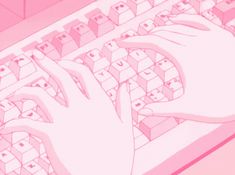 a person typing on a computer keyboard with their hands over the keys, in front of a pink background