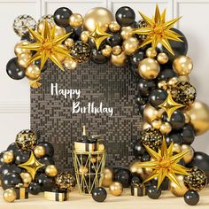 a happy birthday card surrounded by balloons and streamers in gold, black and silver