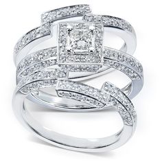 two white gold rings with diamonds on them