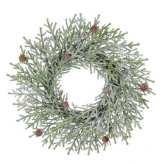 a wreath with pine cones and snow on it