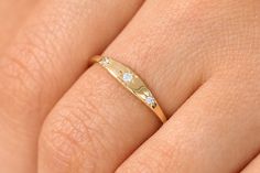 "Star Setting Diamond Stacking Ring / 14k Gold Dainty Delicate Minimal Diamond Ring / avail in 14k Gold / Rose Gold by Ferko's Fine Jewelry Features ✔Made to Order ✔Gold Kt: 14K (also available in 18K) ✔Available Gold Color: Rose Gold, Yellow Gold, White Gold ✔Round Diamond: 1 pc 1.9 MM ✔Round Diamond: 2 pcs 1.3 MM ✔Number of Stones: 3 ✔Total CTW: 0.06 ✔ Diamond Color-Clarity: G Color SI Clarity ✔Ready to Ship in 7-10 Business Days If you have any additional questions about this ring, just hit t Minimal Diamond Ring, Star Setting, Diamond Stacks, Diamond Stacking Rings, Platinum Metal, Rose Gold Diamonds, Rings For Her, Stacking Ring, Moissanite Diamonds