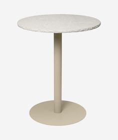 a round table with a white marble top