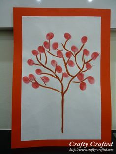 an art project made with paper and watercolors on a white background, depicting a tree