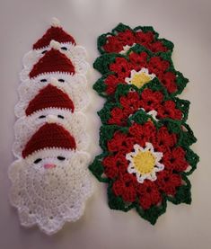 two crocheted santa and snowman place mats