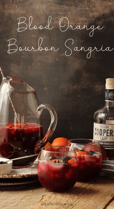 blood orange bourbon sangria is served in glasses and pitcher