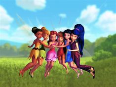 four girls are flying in the air with their arms around each other and one girl is holding on to her back